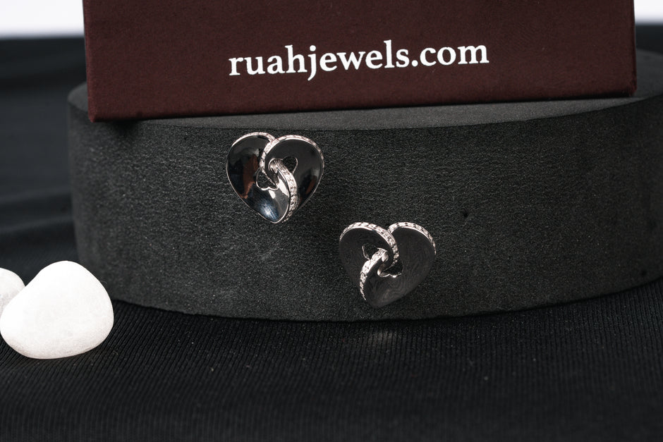 Molten Twisted Hearts Glowline Edge Earrings | Sterling Silver