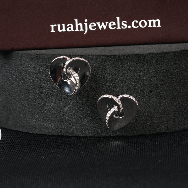 Molten Twisted Hearts Glowline Edge Earrings | Sterling Silver